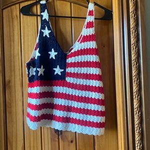 This top is a knitted American flag mid length tank top